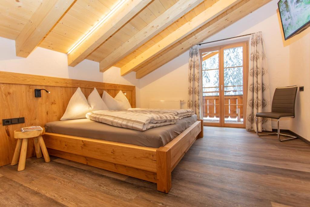 Postel nebo postele na pokoji v ubytování Ferienhaus Neureiter
