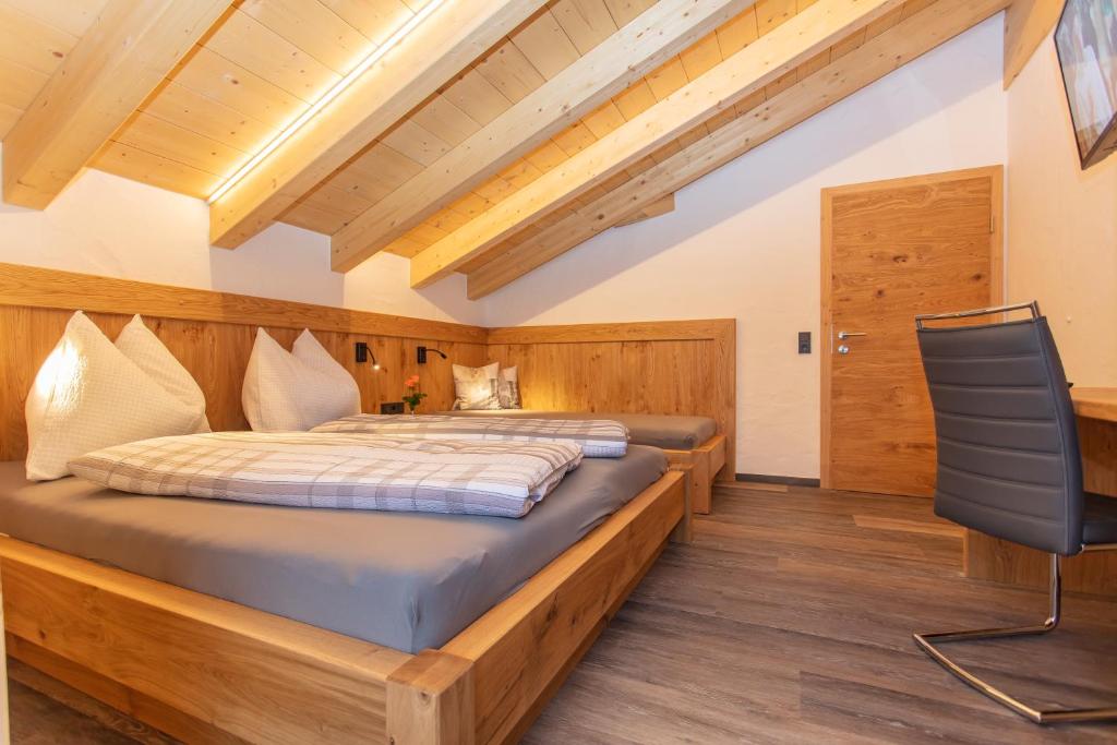 Postel nebo postele na pokoji v ubytování Ferienhaus Neureiter