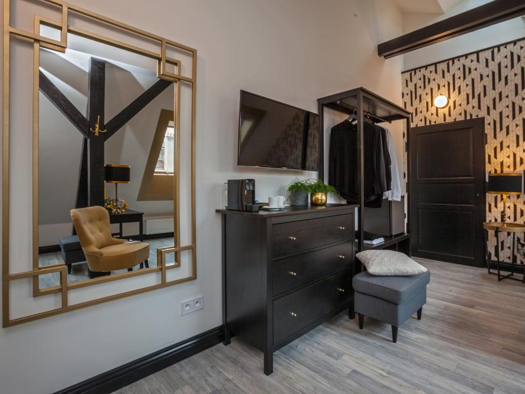 TV a/nebo společenská místnost v ubytování Golden Prague Rooms