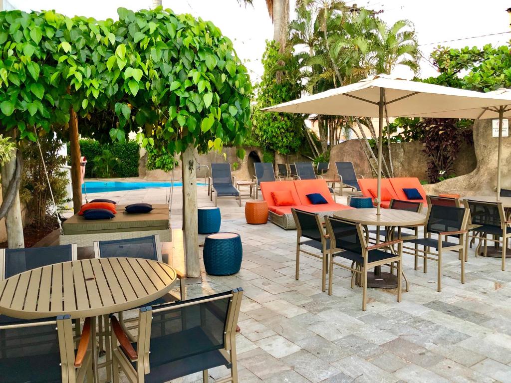 Uma área de estar em Hotel Morada do Sol