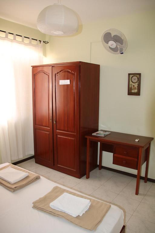 Postel nebo postele na pokoji v ubytování Residencial Raiar