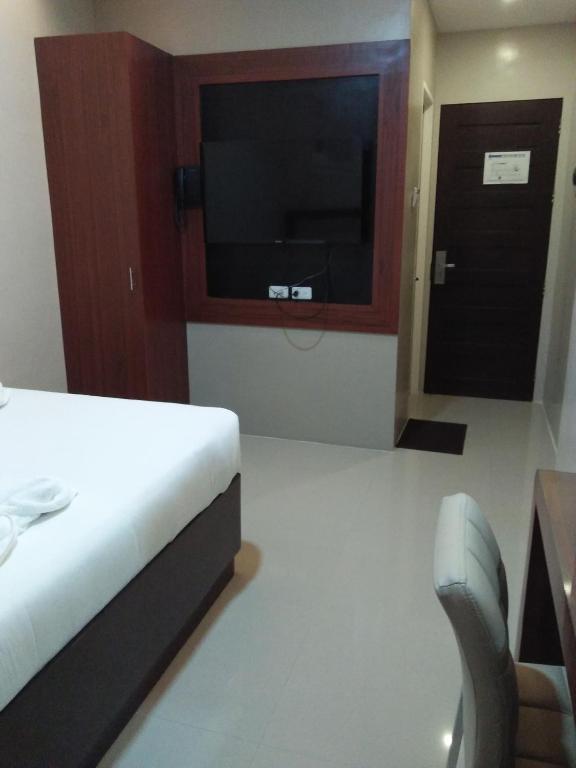 TV a/nebo společenská místnost v ubytování Mezza Hotel