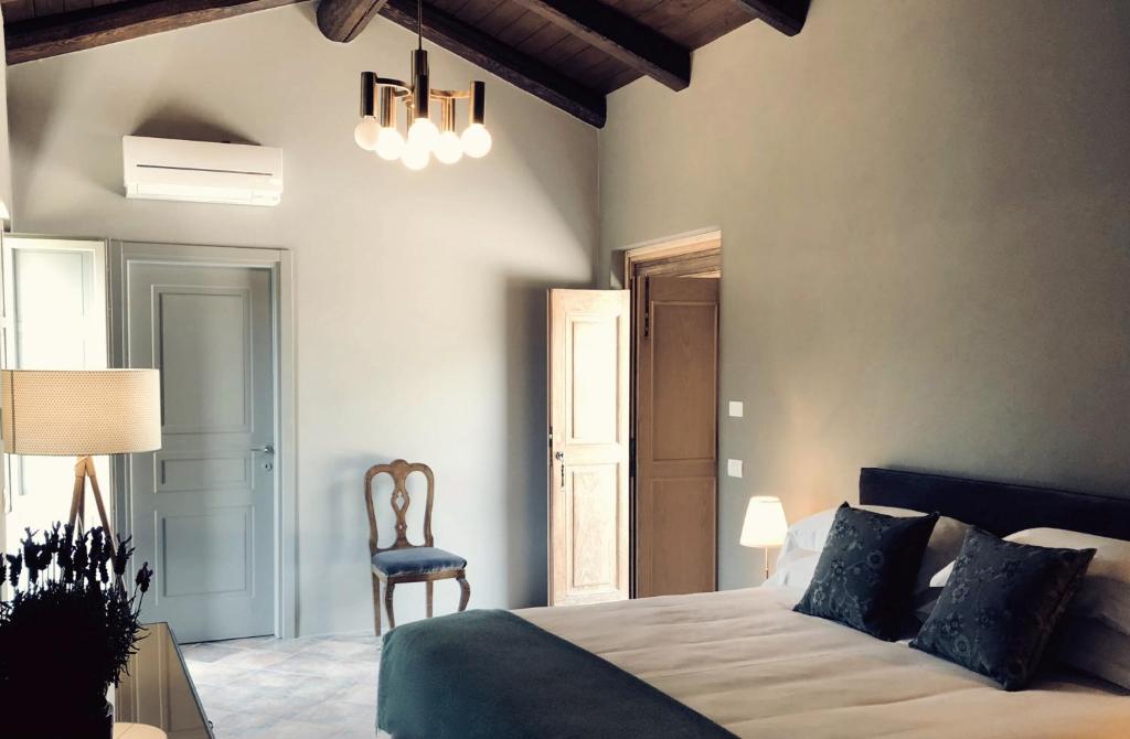 Postel nebo postele na pokoji v ubytování MiaClara Relais