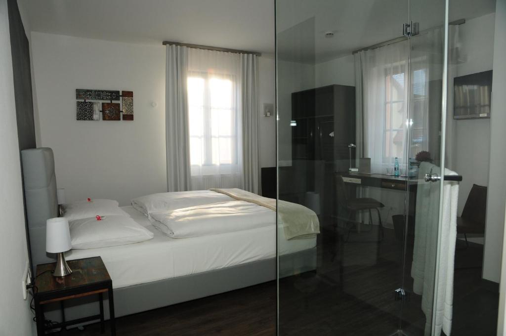 Postel nebo postele na pokoji v ubytování Hotel Sporcher Nest