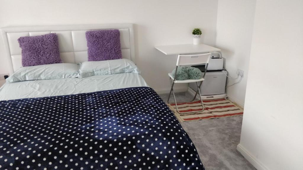 Ένα ή περισσότερα κρεβάτια σε δωμάτιο στο AdB