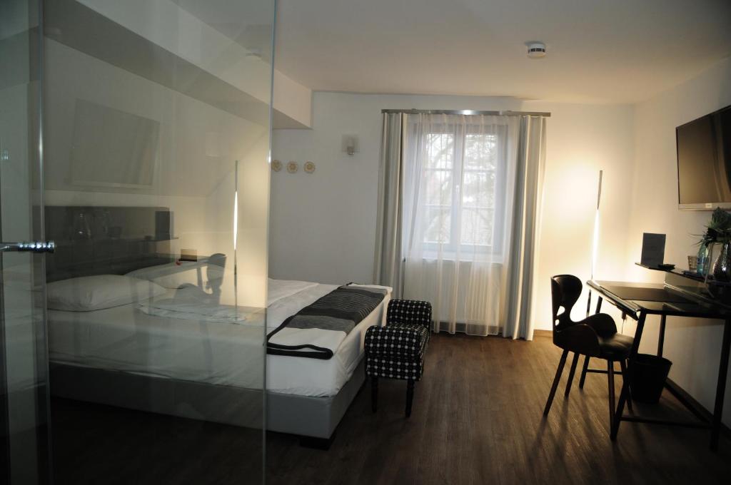 Postel nebo postele na pokoji v ubytování Hotel Sporcher Nest