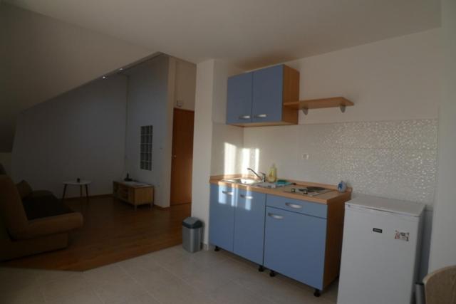 Kuchyň nebo kuchyňský kout v ubytování Kuc kuc apartmani