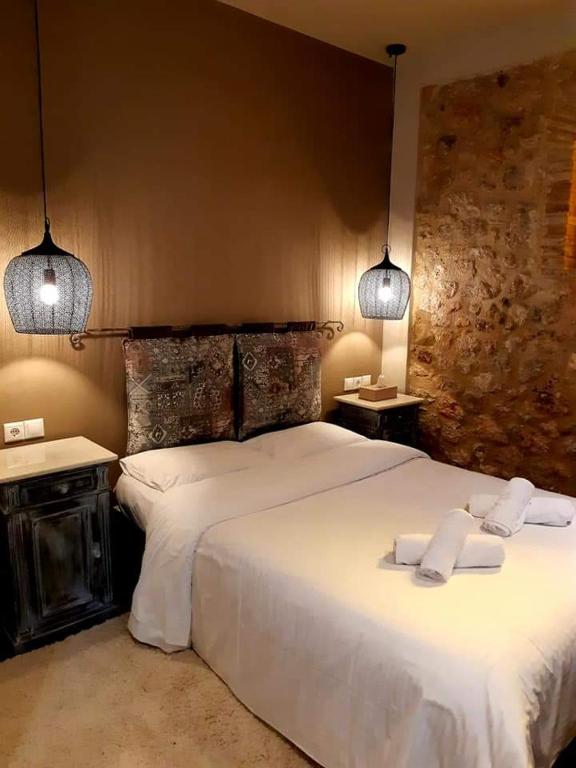 Posteľ alebo postele v izbe v ubytovaní Ganimede Hotel, Galaxidi