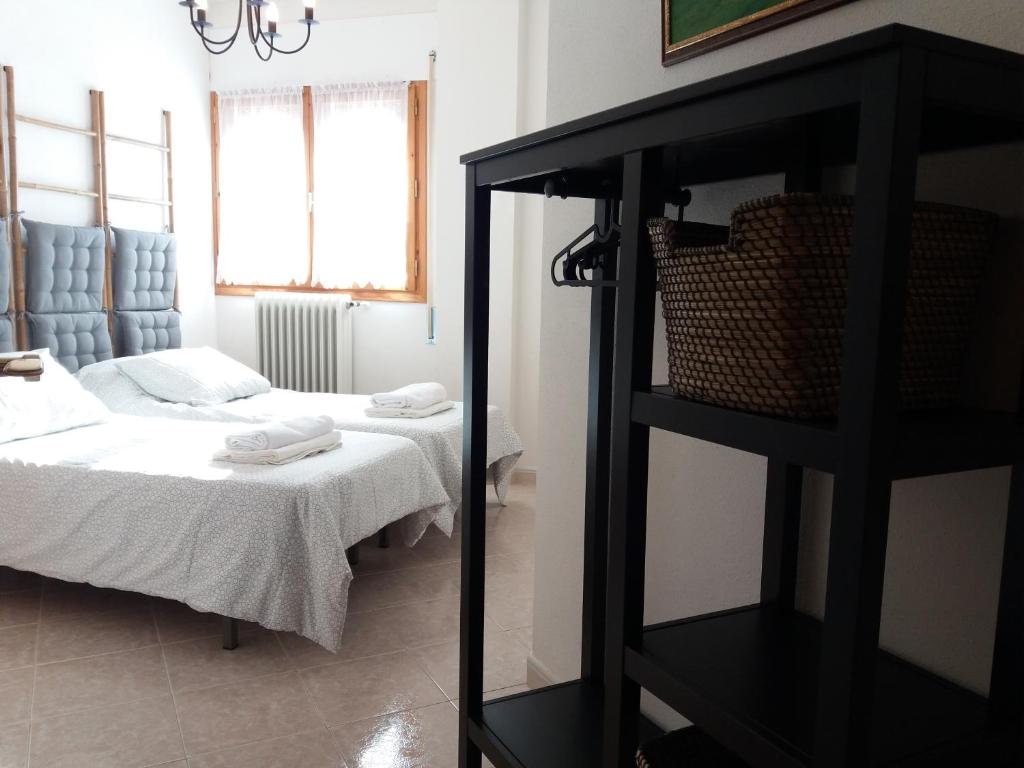 Postel nebo postele na pokoji v ubytování Best Biescas Tourist Home