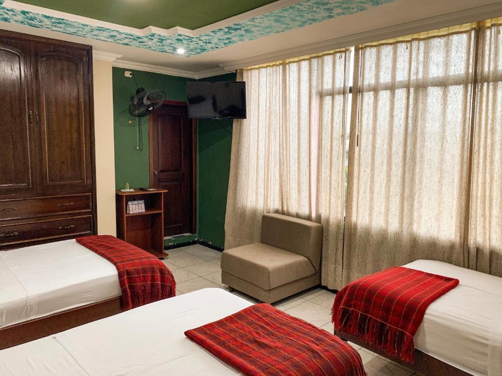 Postel nebo postele na pokoji v ubytování Hotel Somagg