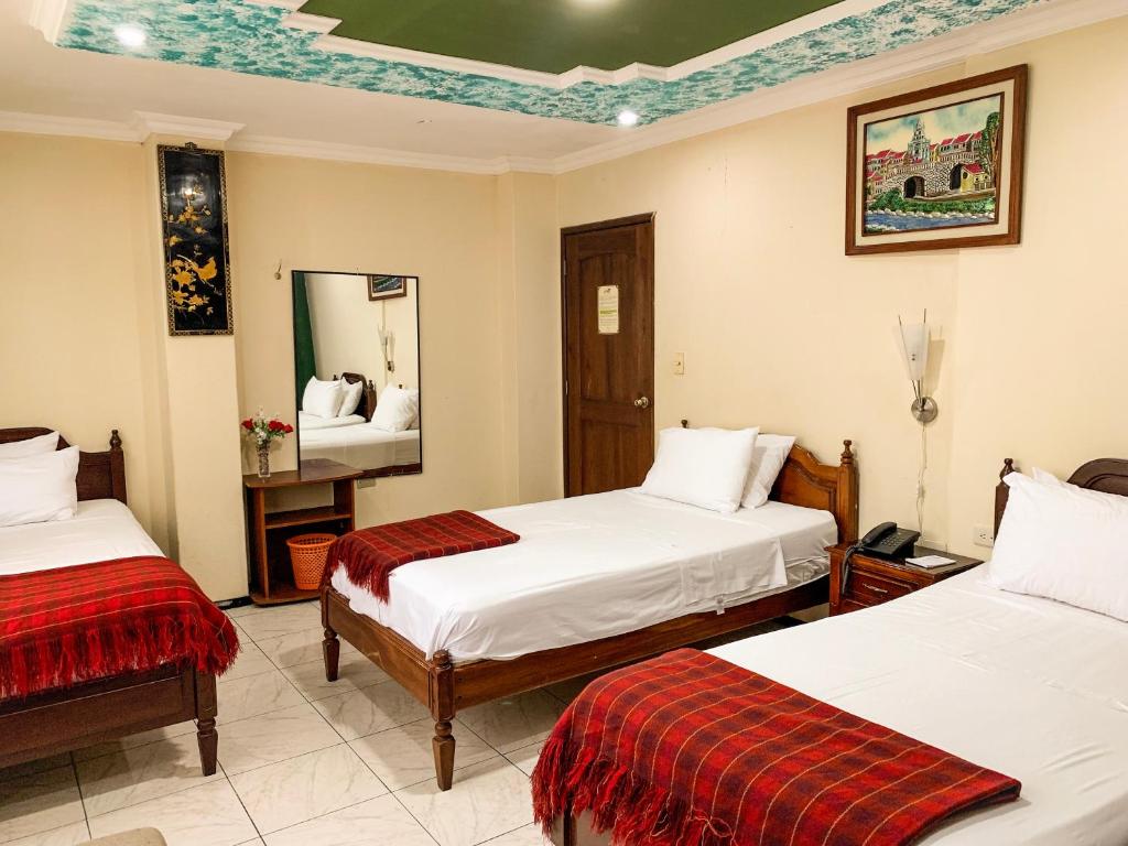 Postel nebo postele na pokoji v ubytování Hotel Somagg