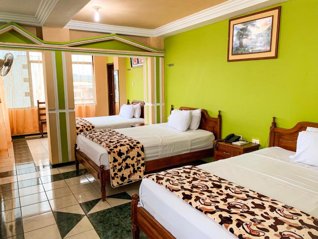 Postel nebo postele na pokoji v ubytování Hotel Somagg