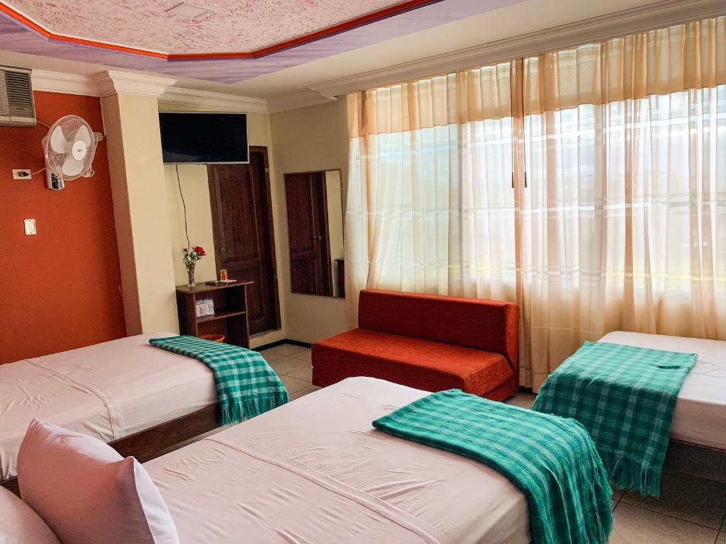 Postel nebo postele na pokoji v ubytování Hotel Somagg