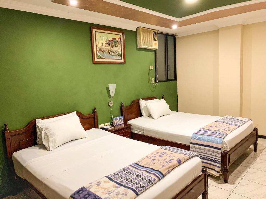 Postel nebo postele na pokoji v ubytování Hotel Somagg