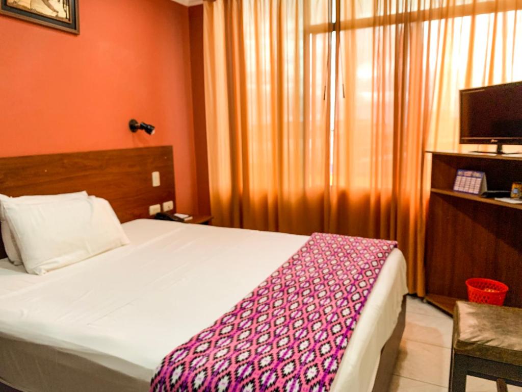 Postel nebo postele na pokoji v ubytování Hotel Somagg