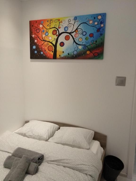 Posteľ alebo postele v izbe v ubytovaní Modern&Cozy Rooms