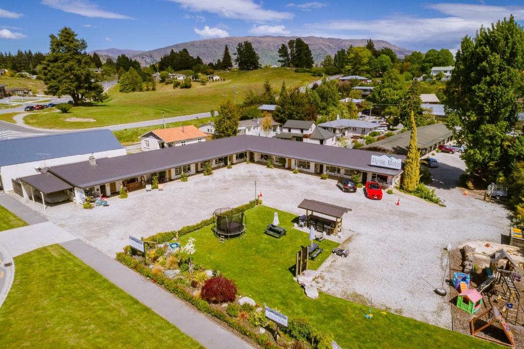 an aerial view of a building with a playground at Alpine Motel in Wanaka