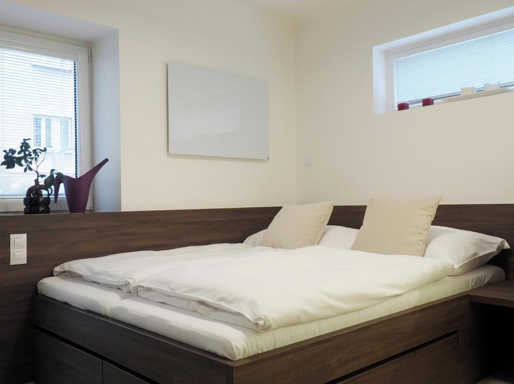 Postel nebo postele na pokoji v ubytování AP10 - Apartments 4U Březinova "Overnight Simply"