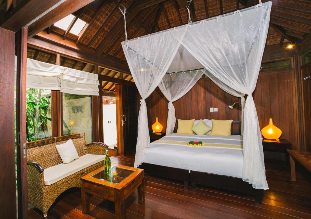 Postel nebo postele na pokoji v ubytování Heaven in Bali