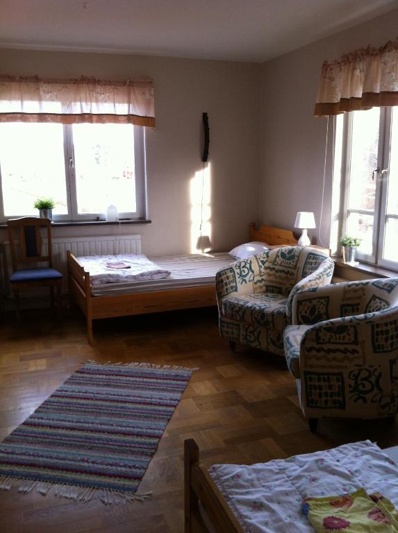 Posteľ alebo postele v izbe v ubytovaní Odensvi Vandrarhem