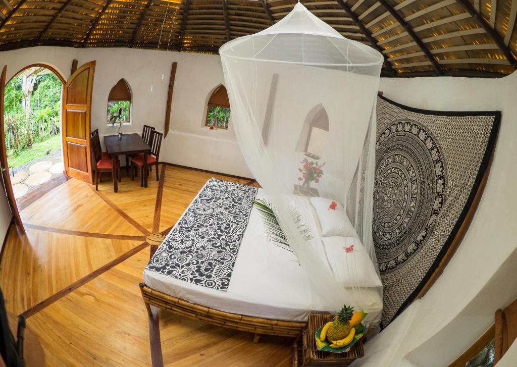 Postel nebo postele na pokoji v ubytování Paradiselodge Casa Romantica