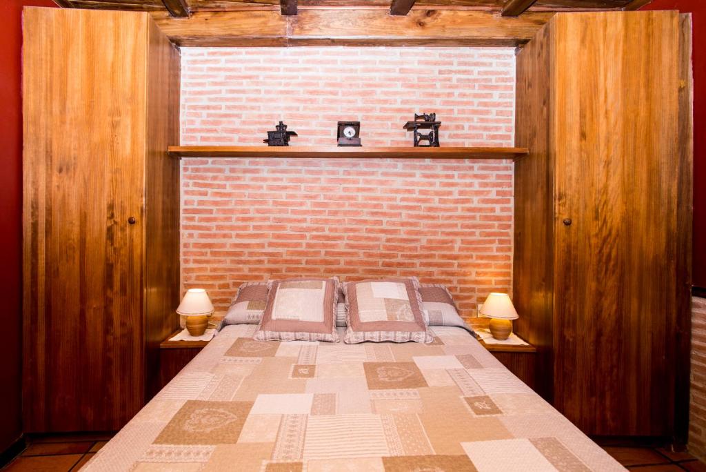Postel nebo postele na pokoji v ubytování LA CASETA Turismo Rural