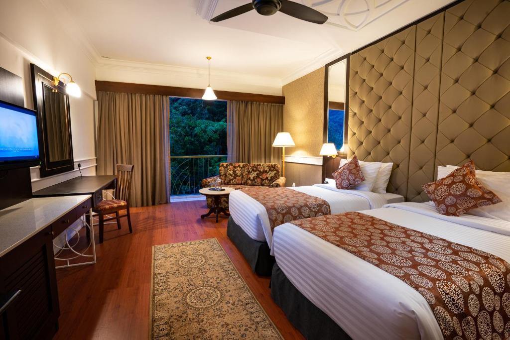 Postel nebo postele na pokoji v ubytování Century Pines Resort Cameron Highlands