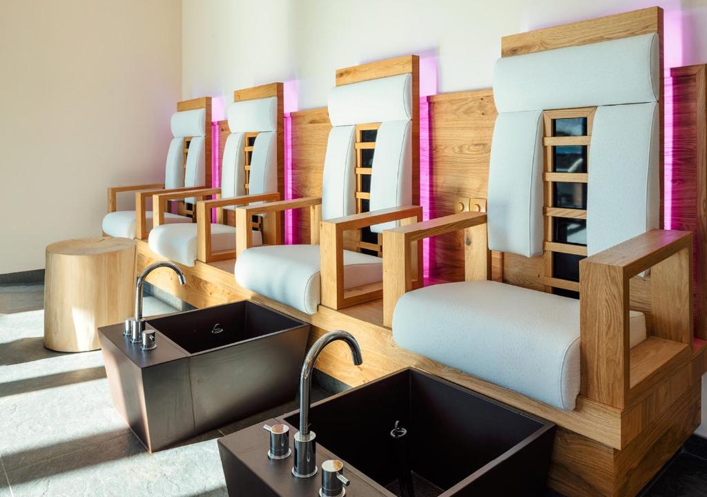 Postel nebo postele na pokoji v ubytování Hotel Garni Alpenjuwel Residenz