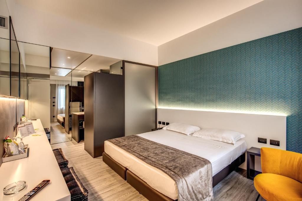 Postel nebo postele na pokoji v ubytování Motel Rona
