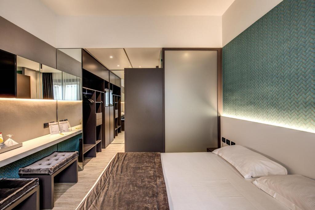 Postel nebo postele na pokoji v ubytování Motel Rona