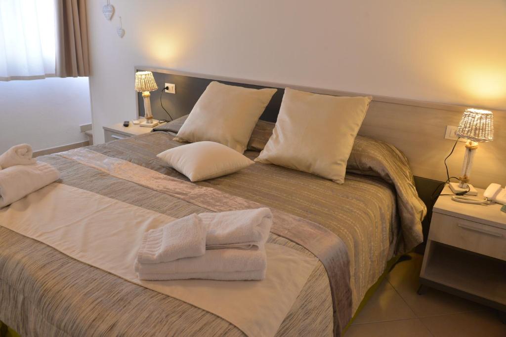 Кровать или кровати в номере Residenza Al Castello
