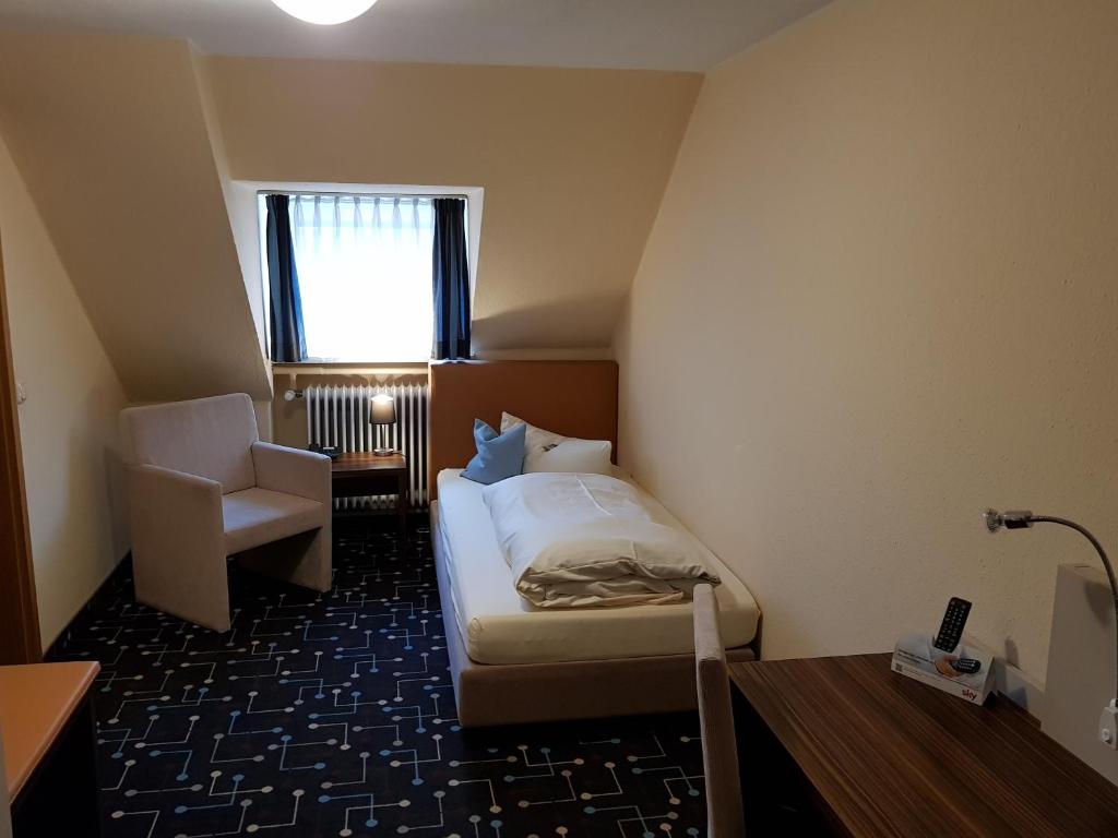 Postel nebo postele na pokoji v ubytování Hotel Königer