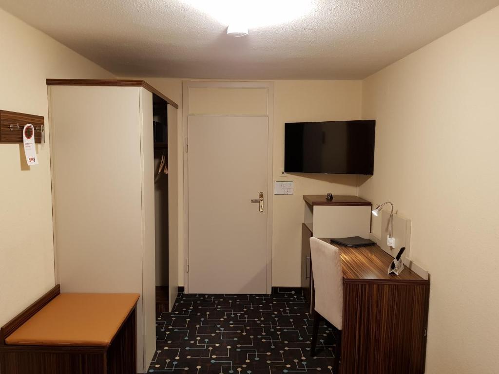 Kuchyň nebo kuchyňský kout v ubytování Hotel Königer