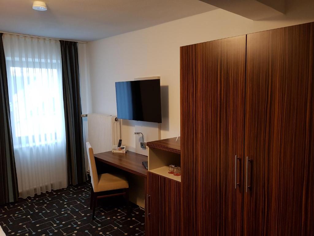 TV a/nebo společenská místnost v ubytování Hotel Königer
