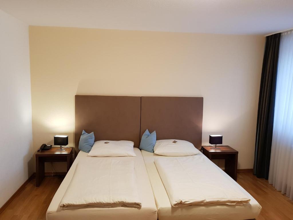Postel nebo postele na pokoji v ubytování Hotel Königer