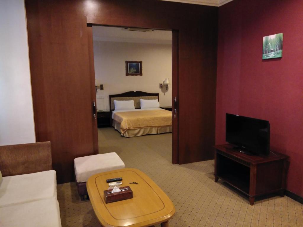 TV a/nebo společenská místnost v ubytování King Park Hotel Tawau