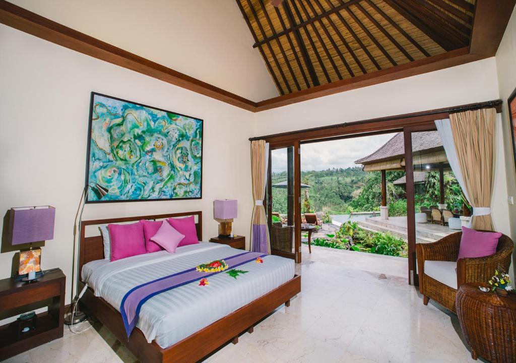 Postel nebo postele na pokoji v ubytování Heaven in Bali