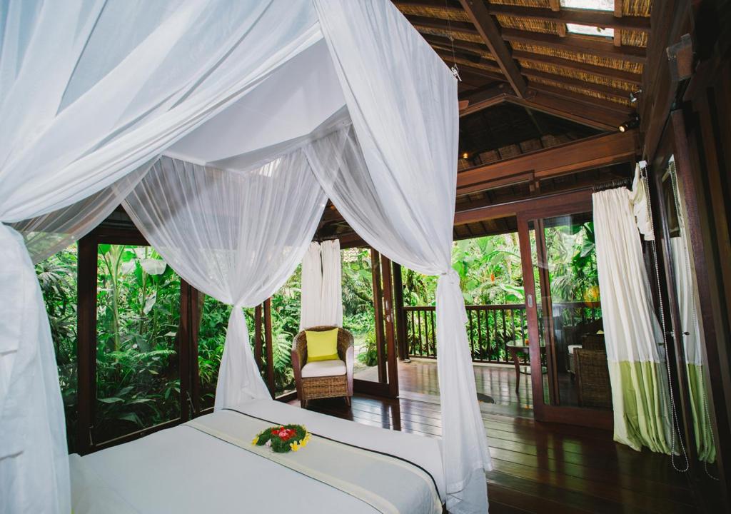Postel nebo postele na pokoji v ubytování Heaven in Bali