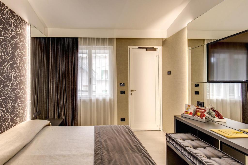 Postel nebo postele na pokoji v ubytování Motel Rona