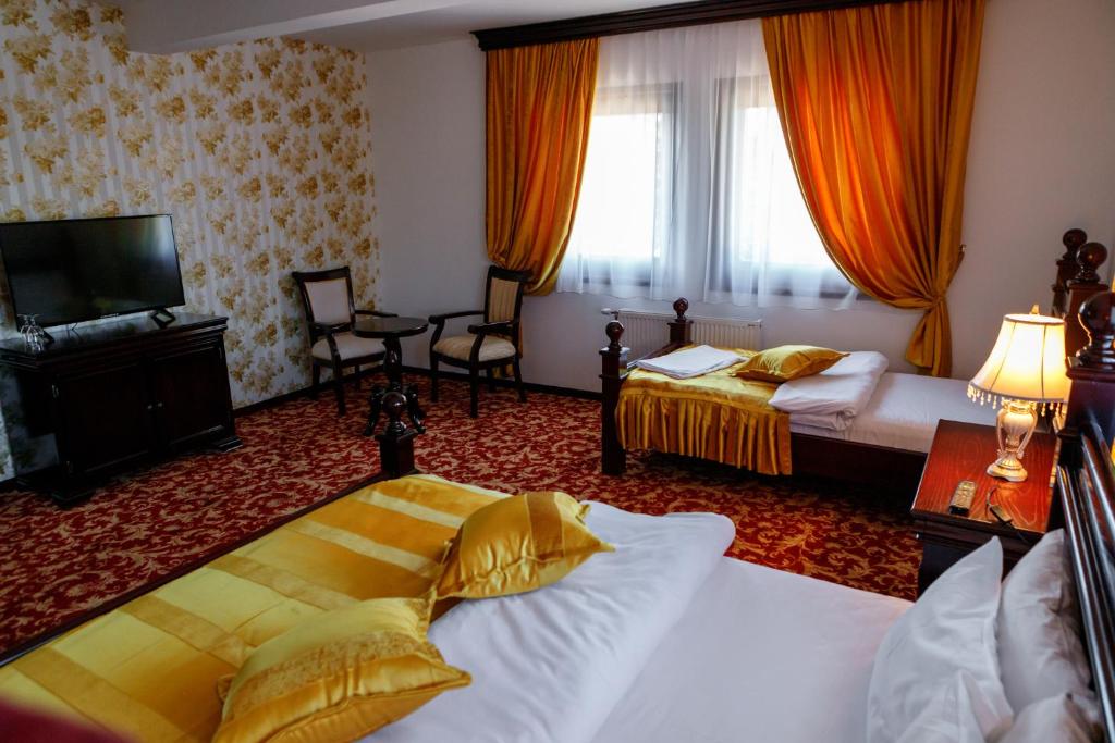Postel nebo postele na pokoji v ubytování Hotel Zlatarski Zlatnik