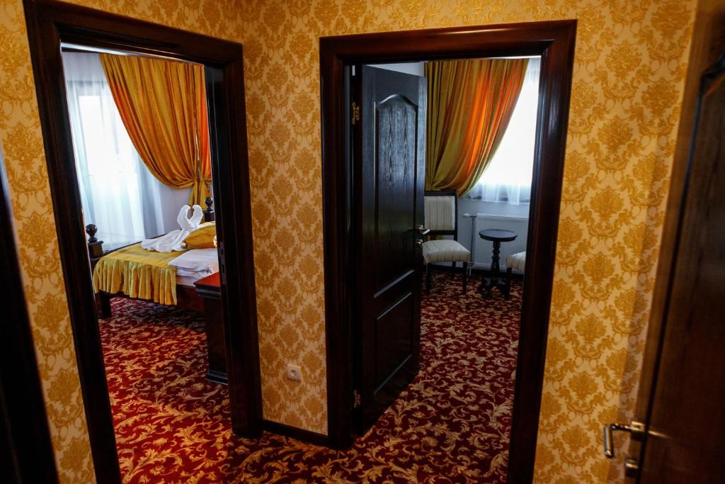 Postel nebo postele na pokoji v ubytování Hotel Zlatarski Zlatnik