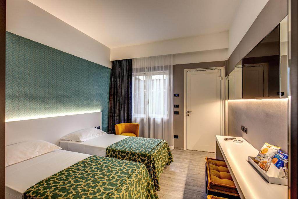 Postel nebo postele na pokoji v ubytování Motel Rona