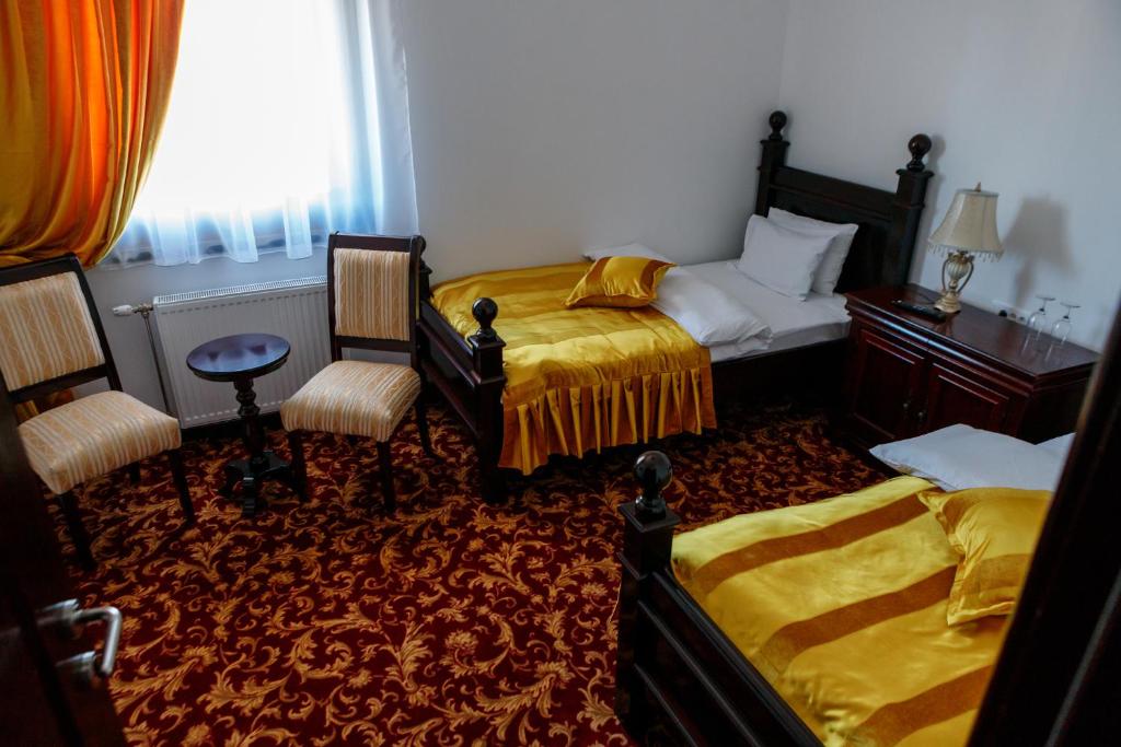 Postel nebo postele na pokoji v ubytování Hotel Zlatarski Zlatnik
