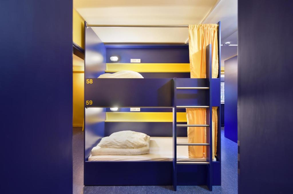 Postel nebo postele na pokoji v ubytování Bed’nBudget Expo-Hostel Dorms