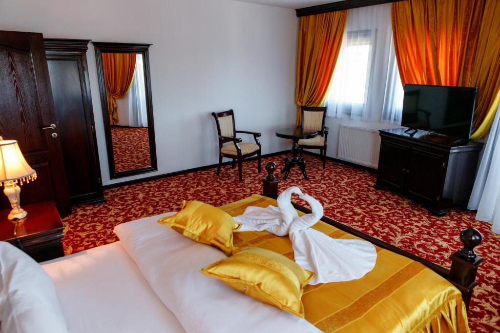 Postel nebo postele na pokoji v ubytování Hotel Zlatarski Zlatnik