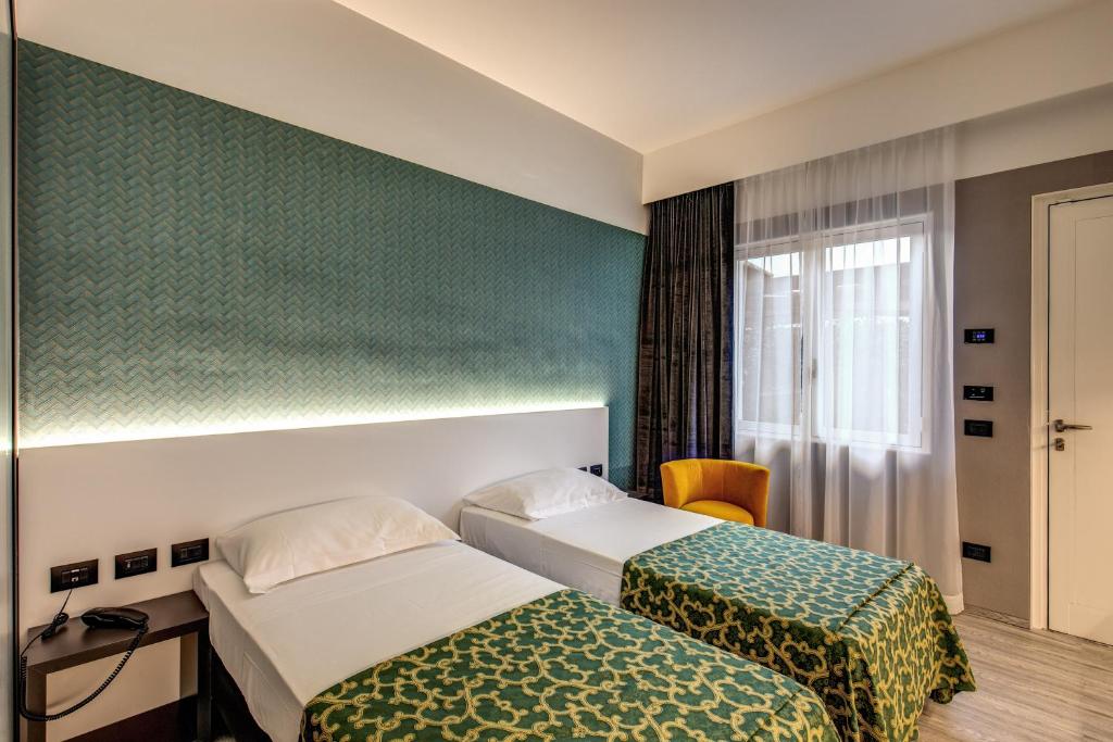 Postel nebo postele na pokoji v ubytování Motel Rona