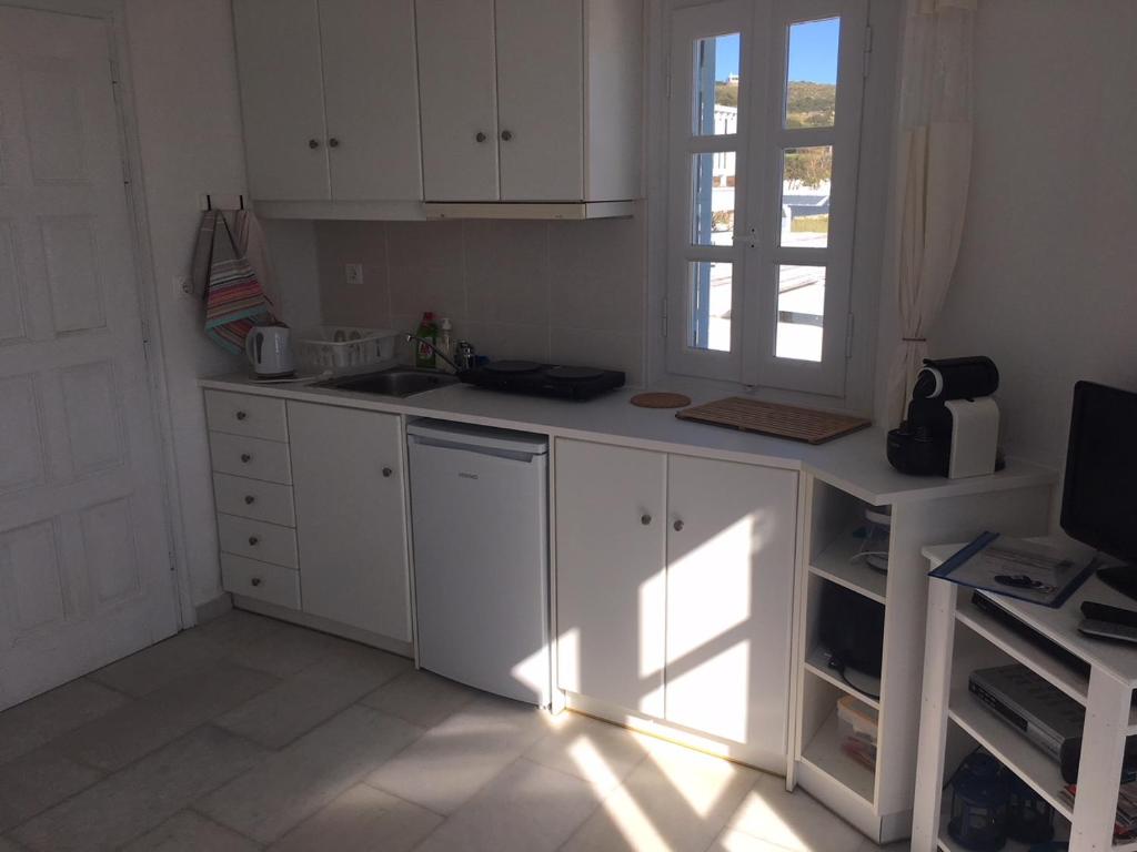 Kuchyňa alebo kuchynka v ubytovaní Ammos - Glyfada Sunset
