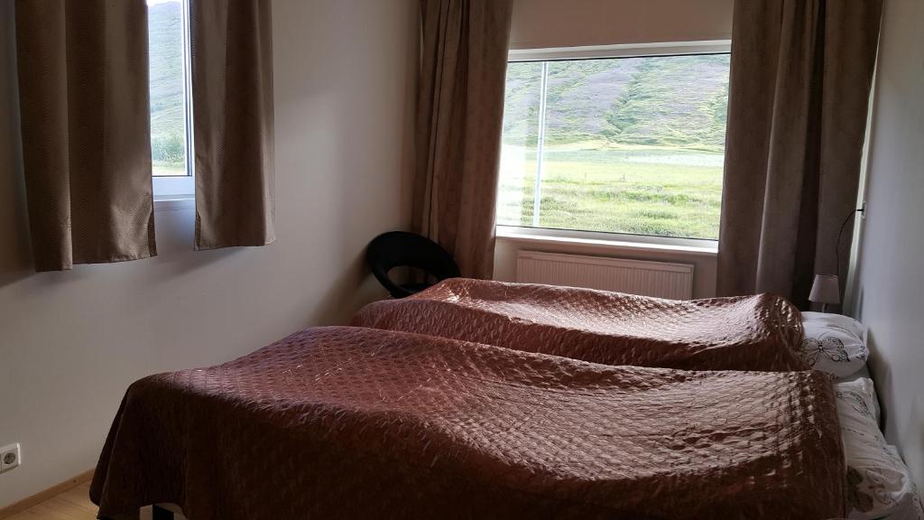 Postel nebo postele na pokoji v ubytování Kidagil Guesthouse