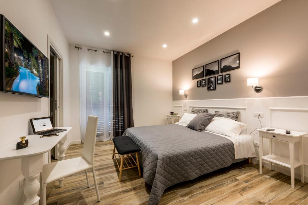 Posteľ alebo postele v izbe v ubytovaní Il Parco dei Poeti B&B