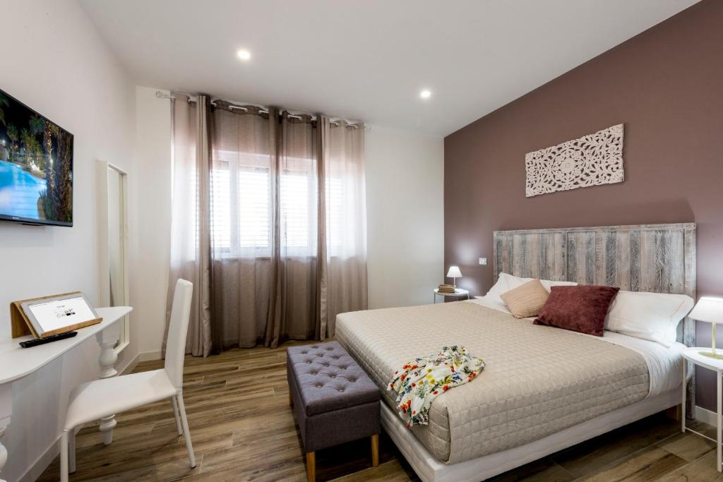 Posteľ alebo postele v izbe v ubytovaní Il Parco dei Poeti B&B